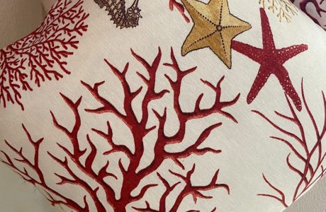 housse de coussin motifs corail rouge